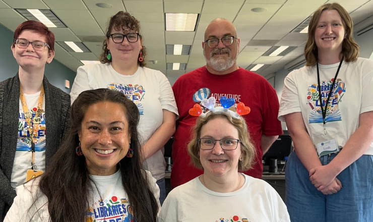 Group photo of the six members of the staff writers team