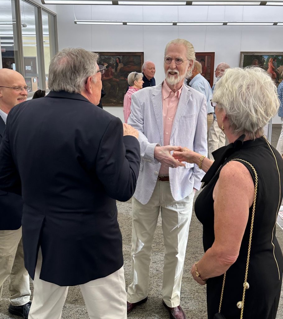 People gathered at art gallery opening of Robert Garey