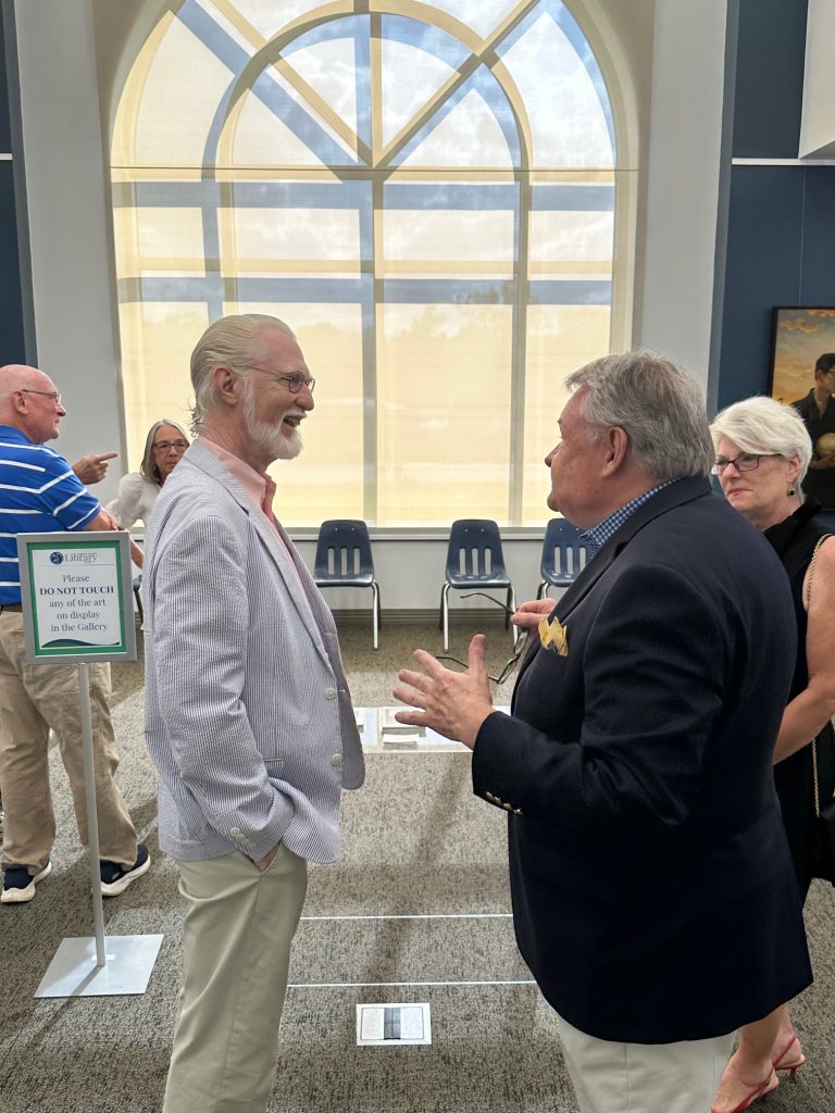 People gathered at art gallery opening of Robert Garey