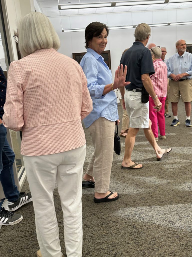 People gathered at art gallery opening of Robert Garey