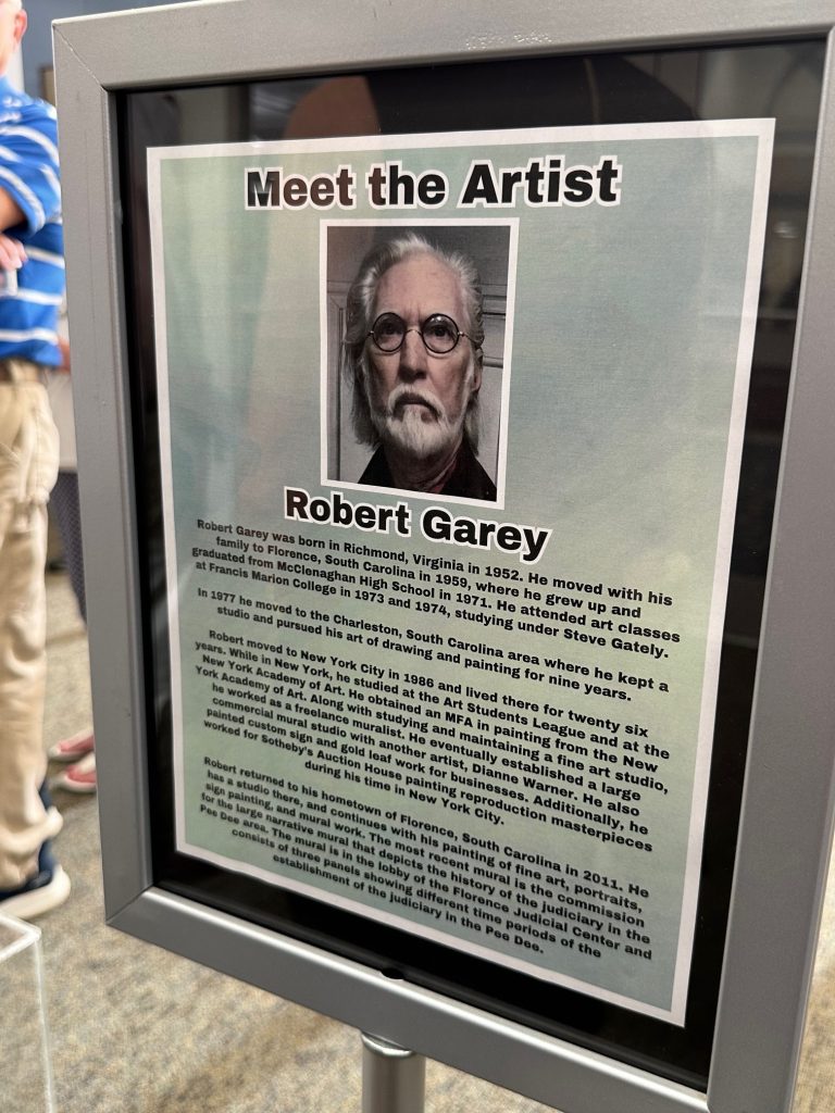 Signage from art gallery opening of Robert Garey