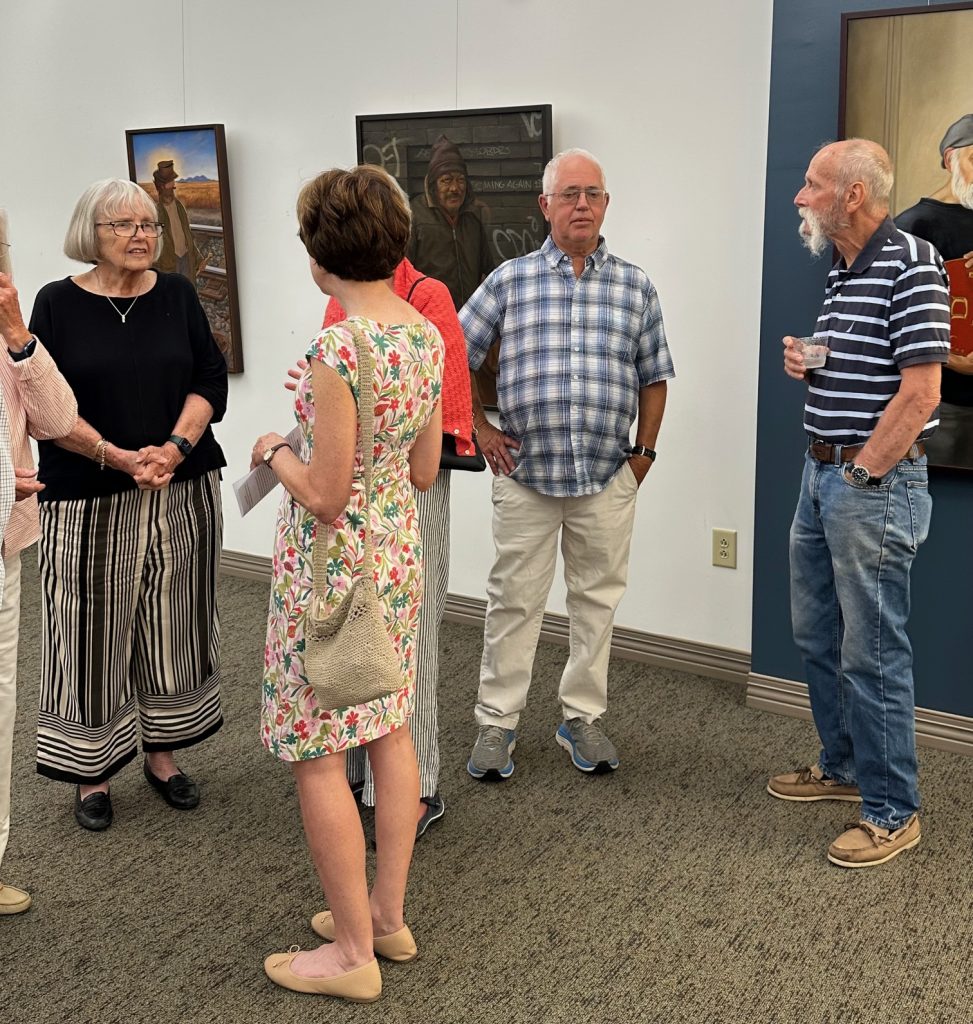 People gathered at art gallery opening of Robert Garey