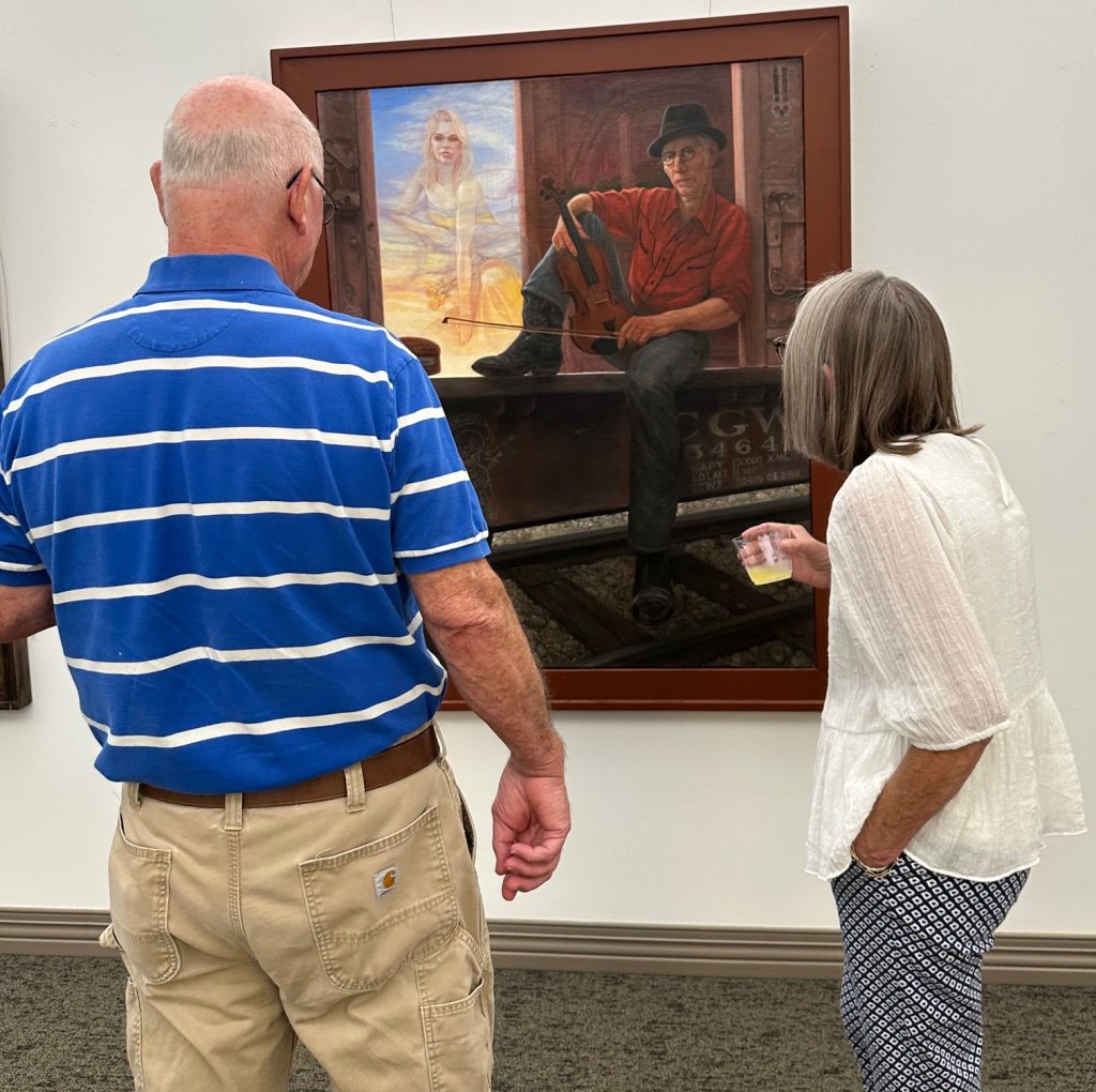 People gathered at art gallery opening of Robert Garey