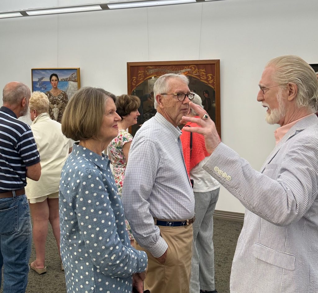 People gathered at art gallery opening of Robert Garey