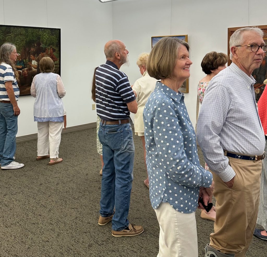 People gathered at art gallery opening of Robert Garey
