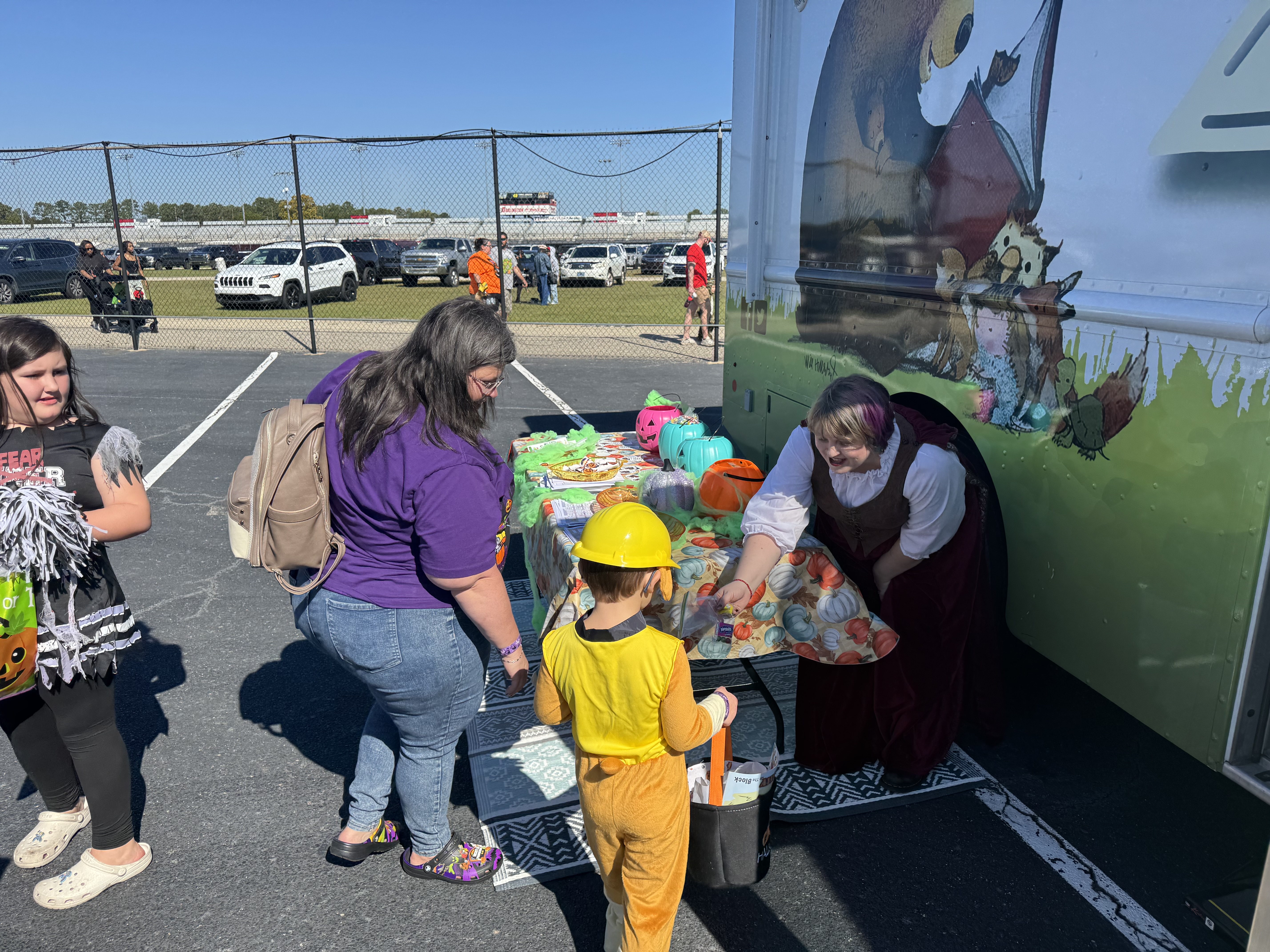 Children lined up to get candy at bookmobile