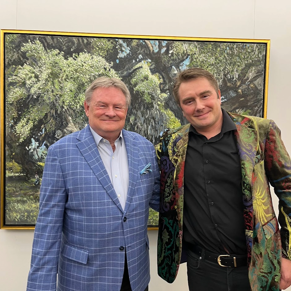 Nikolai Oskolkov standing with donor Willson Powell