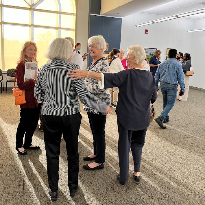 Gallery patrons at exhibit opening of Nikolai Oskolkov