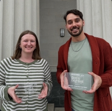 Leah and Caleb holding their Best and Brightest plaques