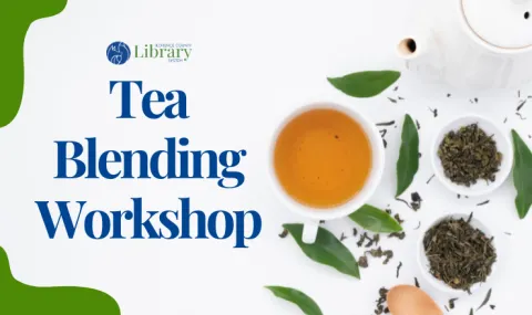 Tea blending workshop with a cup of tea and tea leaves scattered in background
