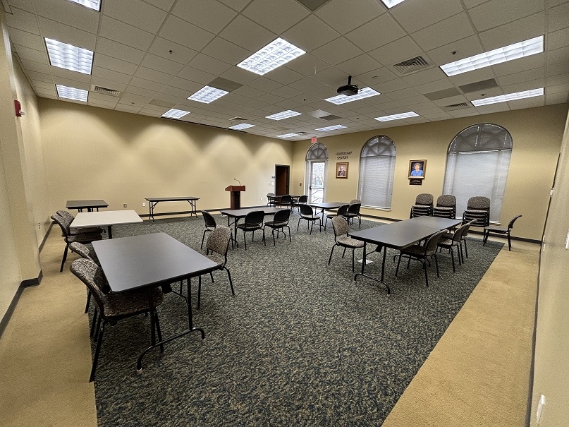View Pamplico library meeting room with table and chairs.