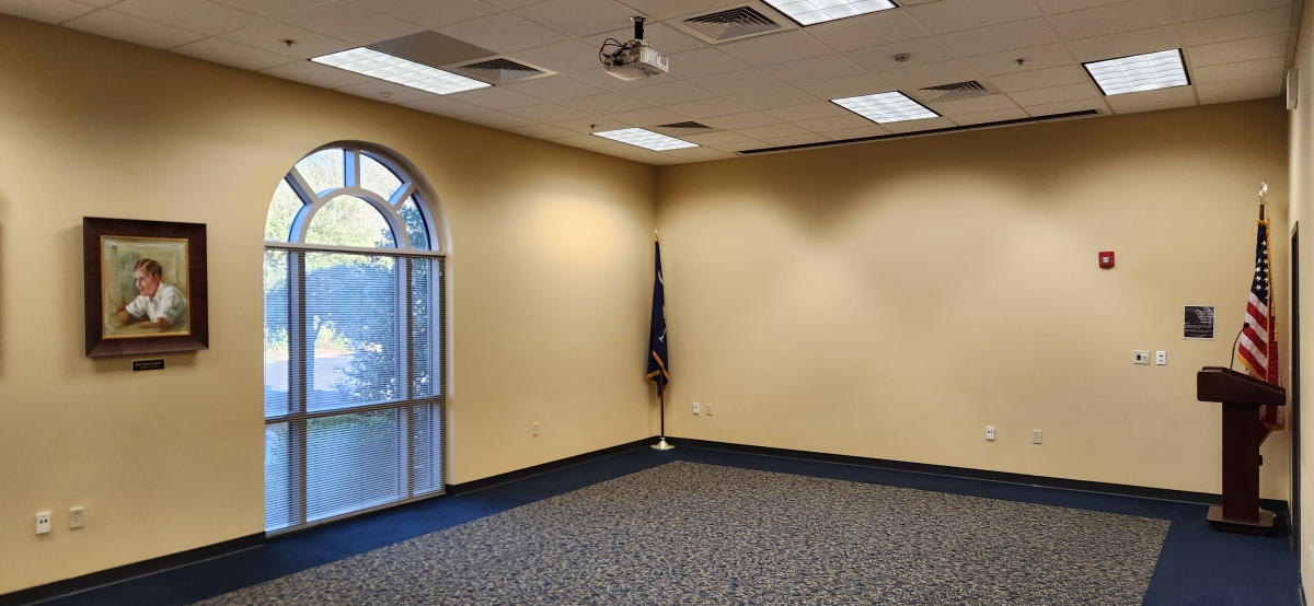 Picture of meeting room at Timmonsville Library with podium and microphone.