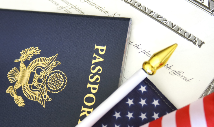 A passport and American flag on a document