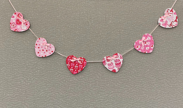 A string garland of hearts in different colors and patterns