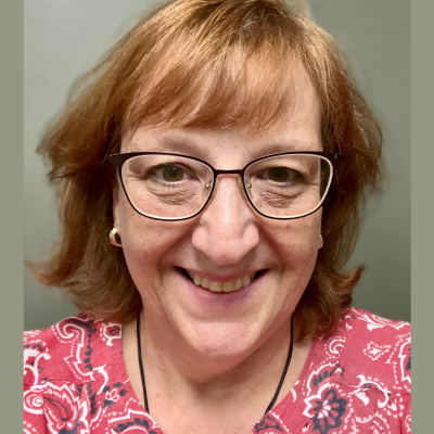 Cathy headshot with glasses